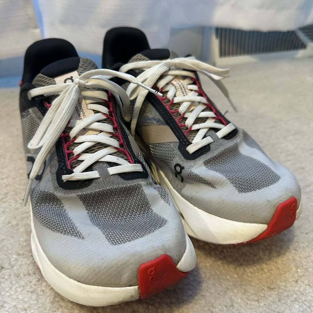 On Running women's Athletic Shoes in Gray and Red